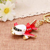 Porte-clés en alliage de zinc poli en forme d'avion de dessin animé |   Porte-clés mousqueton 3D en émail brillant, tendance mode, souvenir d'aviation