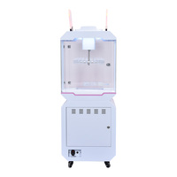 Machine de jeu d'arcade à grue à monnayeur multicolore de haute qualité pour la vente en gros, avec conception durable pour les centres de divertissement