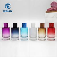 Flacon de parfum en verre cylindrique rond de luxe personnalisé avec impression couleur 30 ml 50 ml 100 ml avec pompe pulvérisateur et boîte