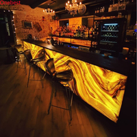Comptoir de bar de luxe en marbre d'onyx led comptoirs de cuisine en pierre noire