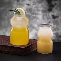Vente en gros Tasse à café en verre PC transparente monocouche créative amusante Design moderne pour fête Tasse à cocktail personnalisée pour bar