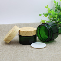Bouteille de conservation en verre écologique de 50g avec couvercle en bambou, design moderne, empilable, compatible lave-vaisselle, préservation de la fraîcheur pour les entreprises