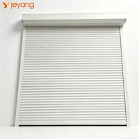 Porte à enroulement isolée en aluminium à économie d'énergie avec fonction coupe-vent, design industriel pour entrepôts