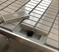 Banc hydroponique mobile à flux et reflux avec système de rails roulants pour serre commerciale