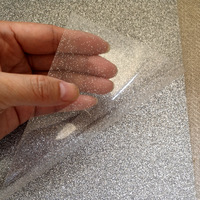 Película de Vinilo de Poliuretano con Purpurina Termotransferible en Rollo Dividido para Uso en Prendas de Vestir, Modelo G056