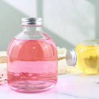 Envase de vidrio esmerilado de 300ml y 500ml con forma de bulbo, tapa de rosca de acero estañado, reciclable, para uso doméstico, para zumos, bebidas fermentadas y licores de frutas.