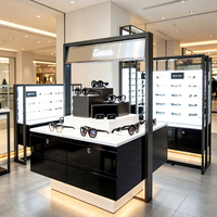 Hochwertiger Marken-Brillen-Verkaufsstand |   Weiß-Schwarzer LED-Sonnenbrillen-Präsentationsschrank für Kaufhaus-Optik-Boutique
