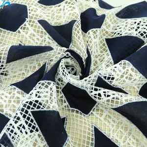Penjualan langsung pabrik gaun wanita nyaman dan lembut pola geometris kain berongga mode kain bordir