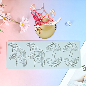 Moule en silicone en forme de feuille de Ginkgo - Moule à fondant en forme d'éventail à 4 cavités pour la décoration de gâteaux, la fabrication de chocolats et de bonbons, qualité alimentaire - Product Image 1