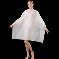 Cape jetable de coupe de cheveux pliable pour salon de coiffure Cape enveloppante de coiffure Capes de couverture en tissu protecteur de coupe de cheveux rasoir propre Apro