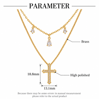 Collier minimaliste délicat à double croix superposée, élégant et de haute qualité, en laiton plaqué or 14 carats, pour femmes, de la marque ARNAN