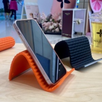 Support de téléphone et tablette pliable en silicone, antidérapant, pliable de manière créative pour tous les angles, accessoire de voyage pour bureau