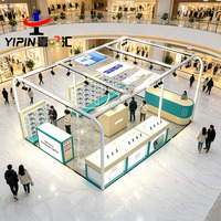 Meuble de magasin mobile moderne haut de gamme, vitrine murale pour étuis de téléphone et électronique pour la vente au détail de téléphonie mobile