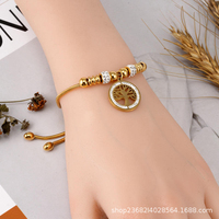 Bracelet élégant en acier inoxydable avec perles en cristal en forme de cœur et croix sertie de diamants en acier titane pour femmes