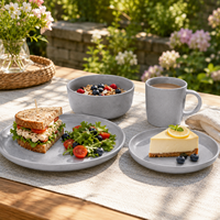 Service de table 16 pièces gris mat moucheté en céramique et grès : assiettes, bols et tasses