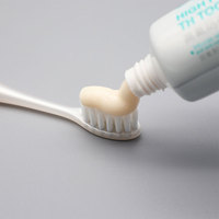 Dentifrice blanchissant anti-sensibilité au fluorure personnalisable en gros, logo personnalisé, emballage de luxe, anti-caries à domicile