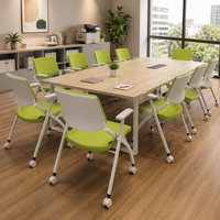 Chaise de conférence pliante moderne avec accoudoirs, structure en fer et roulettes, pour la formation commerciale