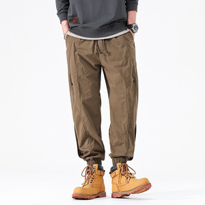 Vente chaude salopette attachée à la jambe hommes printemps pantalons Joker lâche taille élastique décontracté pantalon droit nouveau beau pantalon pour hommes - Product Image 1