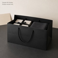 Sac shopping en papier noir A4 avec poignée en corde, design rectangulaire peu profond, pour cadeaux, événements commerciaux, vente en gros et impression personnalisée