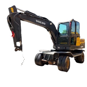 Excavatrice sur pneus Daewoo d'occasion Volvo LG670 avec moteur Doosan, boîte de vitesses, pompe, roulement, attache rapide, brise-roche et tarière - Product Image 1