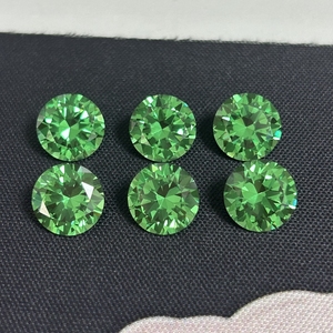 มีสินค้าในสต็อก หินสังเคราะห์ YAG สีเขียวทรงกลมขนาด 10 มม. หินอัญมณี Yttrium Aluminum Garnet ที่เพาะเลี้ยงในห้องปฏิบัติการ ขายส่งจำนวนมากสำหรับอุปกรณ์เครื่องประดับ - Product Image 1