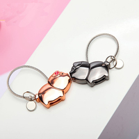 Porte-monnaie porte-clés adorable pour couple, thème Saint-Valentin, plaqué or rose et noir, bijou tendance pour homme et femme, pendentif UV