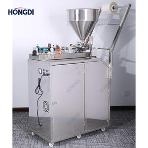 Machine d'emballage verticale automatique avec trémie chauffante et remplisseur de liquides haute précision pour sachets de sauce soja, cosmétiques et aliments en film - Product Image 6