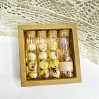 Thé en fleurs fait main en gros, emballage en tube à essai, boule de thé en fleurs aromatisée, thé de haute qualité, boissons chaudes chinoises