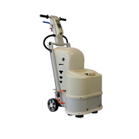 Machine à meuler le béton avec aspiration intégrée pour sols en béton