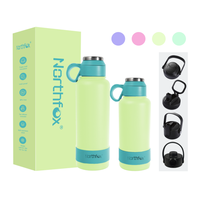 Bouteille d'eau isotherme sous vide en acier inoxydable écologique de 32 oz avec logo personnalisé, isolation thermique 12-24h, large ouverture et base en silicone avec poignée