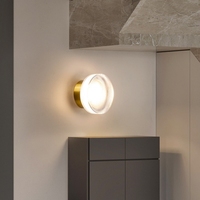 Applique murale minimaliste moderne en verre style puce de pomme de terre à fossettes pour hôtel chambre chevet fond décoration éclairage