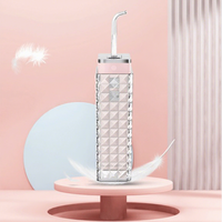 Mini Hydropulseur Portable Pliable 100 ml, Design Rouge à Lèvres Diamant, Économie d'Espace, IPX7, USB, Utilisation en Voyage et en Extérieur, Longue Autonomie de la Batterie