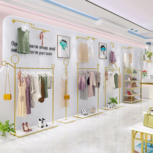 Vente en gros d'étagères modernes en acier inoxydable pour magasin de vêtements <span class=keywords><strong>Boutique</strong></span> présentoirs à vêtements de style européen pour magasin de détail - Product Image 1