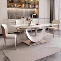Table à manger extensible en acier inoxydable de style italien ensemble de chaises Design moderne 6 places légères de luxe prêtes pour les mariages de petite taille
