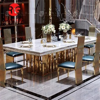 Ensemble de table de salle à manger moderne de luxe pour 12 personnes en marbre noir avec pieds en acier inoxydable poli doré