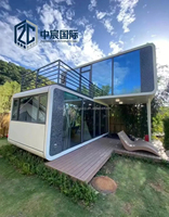 Casa Cápsula Moderna Zhongchen con Esquinas Curvas y Ventanas de Vidrio Completas, Espacio de Vivienda Modular Portátil