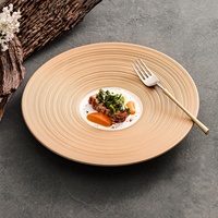 Assiette peu profonde en porcelaine à motif uni peinte à la main, style luxe léger haut de gamme, or rose, pour cuisine occidentale
