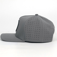 Casquette laser 5 panneaux à visière incurvée avec patch en caoutchouc et trous circulaires, très populaire