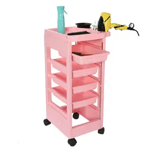 Chariot de salon mobile en plastique rose avec 4 roues chariot d'équipement de meubles de barbier de qualité chariot PP matériaux usage domestique de beauté