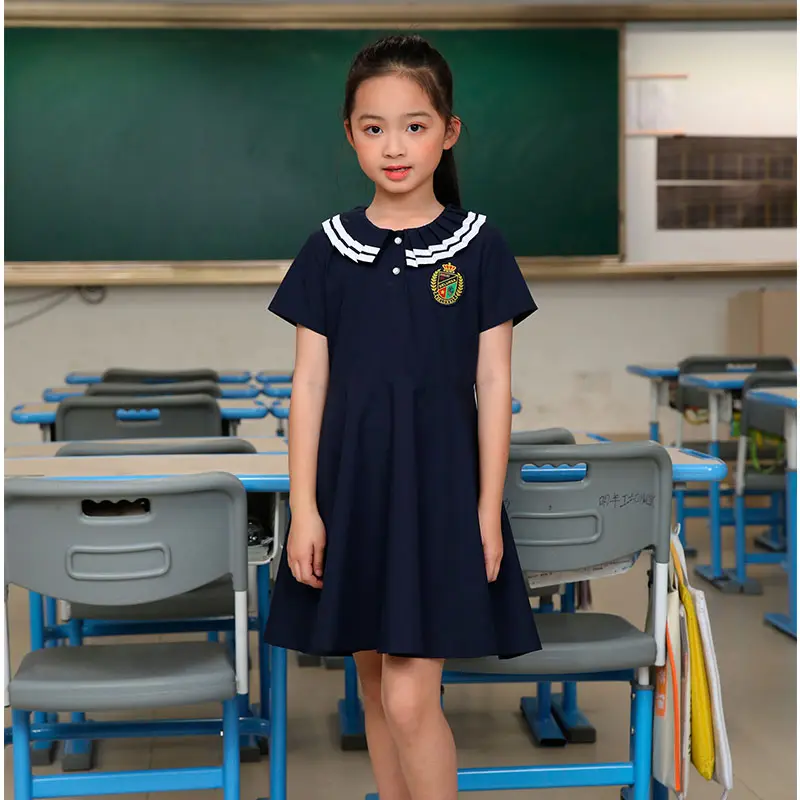 Großhandel Fabrik preis Sommer und Herbst Grundschule Schürze Marineblau Mädchen Kleid Singapur Schuluniformen