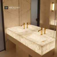 Lavabo moderne rétroéclairé en quartz blanc pour salle de bain de luxe, double vasque translucide en surface solide pour hôtel et centre commercial