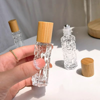 Flacon de parfum en verre transparent de luxe de 10 ml, forme élégante, effet ondulé, vaporisateur à bille pour crème pour le visage, mascara, compte-gouttes pour les yeux