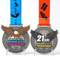 Médaille ronde personnalisée en argent vieilli moulé sous pression avec aile d'aigle 3D et détails en émail souple pour les événements du marathon de Davao City