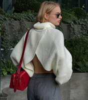 Pull à col roulé pour femmes en vrac automne hiver mode haut tricoté avec des pulls de conception de découpe dos nu uniques