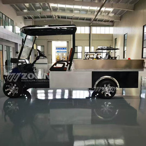 Chariot de golf électrique utilitaire avec benne basculante, carrosserie noire et argentée, conception quatre places, modèle d'exposition intérieur - Product Image 2