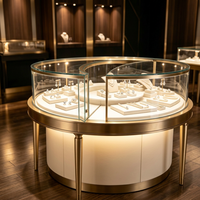 Comptoir de présentation de bijoux en verre incurvé rond avec éclairage LED, cadre en métal doré de luxe, vitrine pour la présentation de bijoux, mobilier de présentation de bijoux