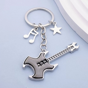 Nuevo llavero de guitarra musical de dos tonos con colgante de pentagrama para bolsos y llaves de coche - Product Image 5