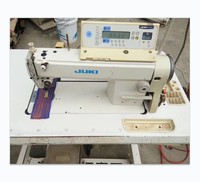 Machine à coudre plate industrielle Juki DDL-5550N-7 d'occasion, à une aiguille, informatisée, avec coupe-fil automatique et moteur servo