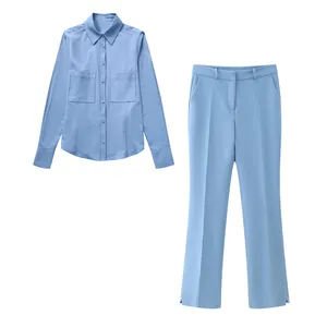 Light blue color buttons up front pockets turn down collar long sleeve casual modest blouse for women