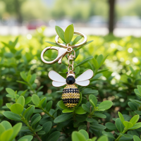 Haute qualité en gros personnalisé mignon animal porte-clés logo vierge kawaii dessin animé pailleté coloré métal porte-clés abeille avec diamant